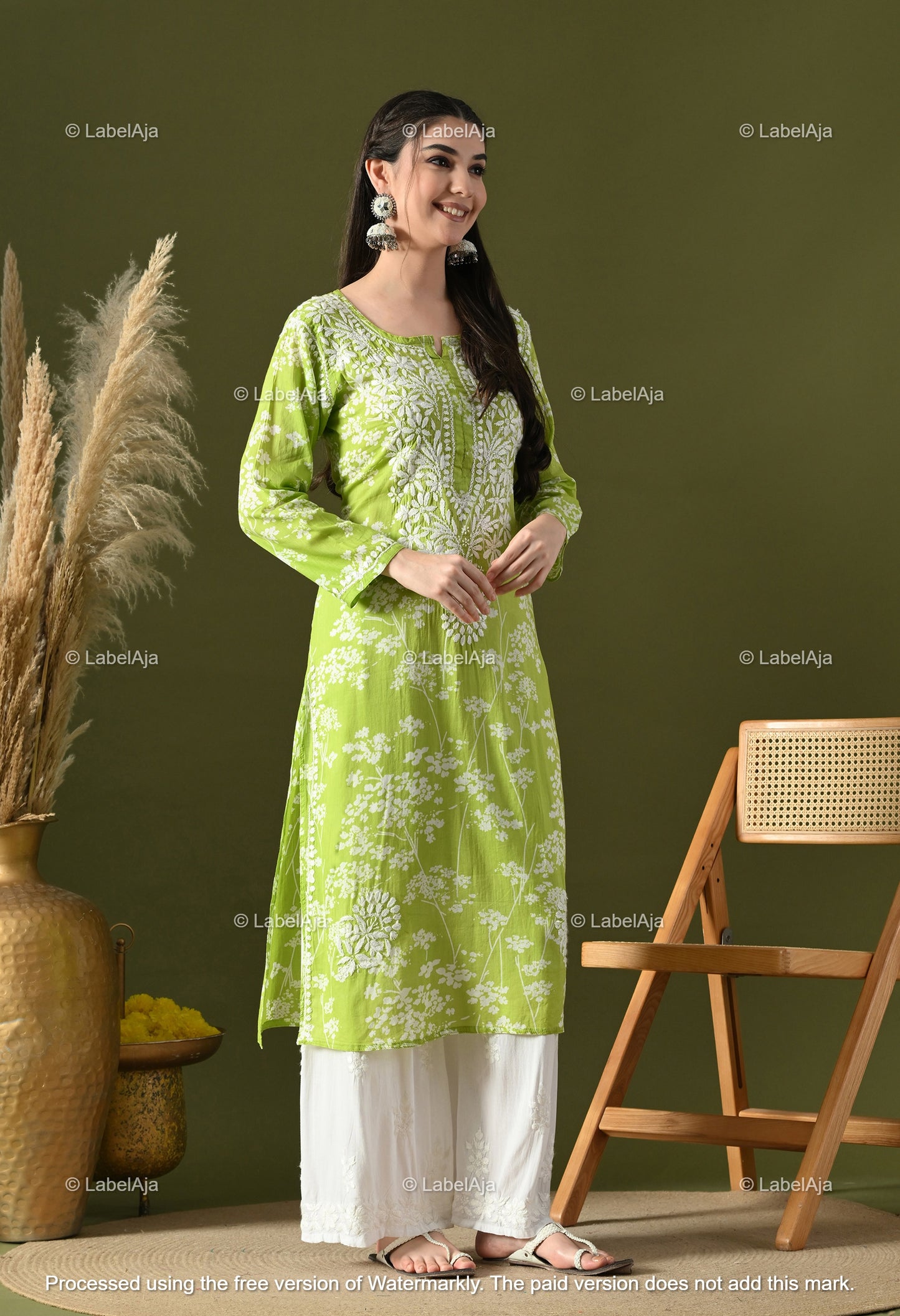 Pankhuri mulmul long chikankari kurti