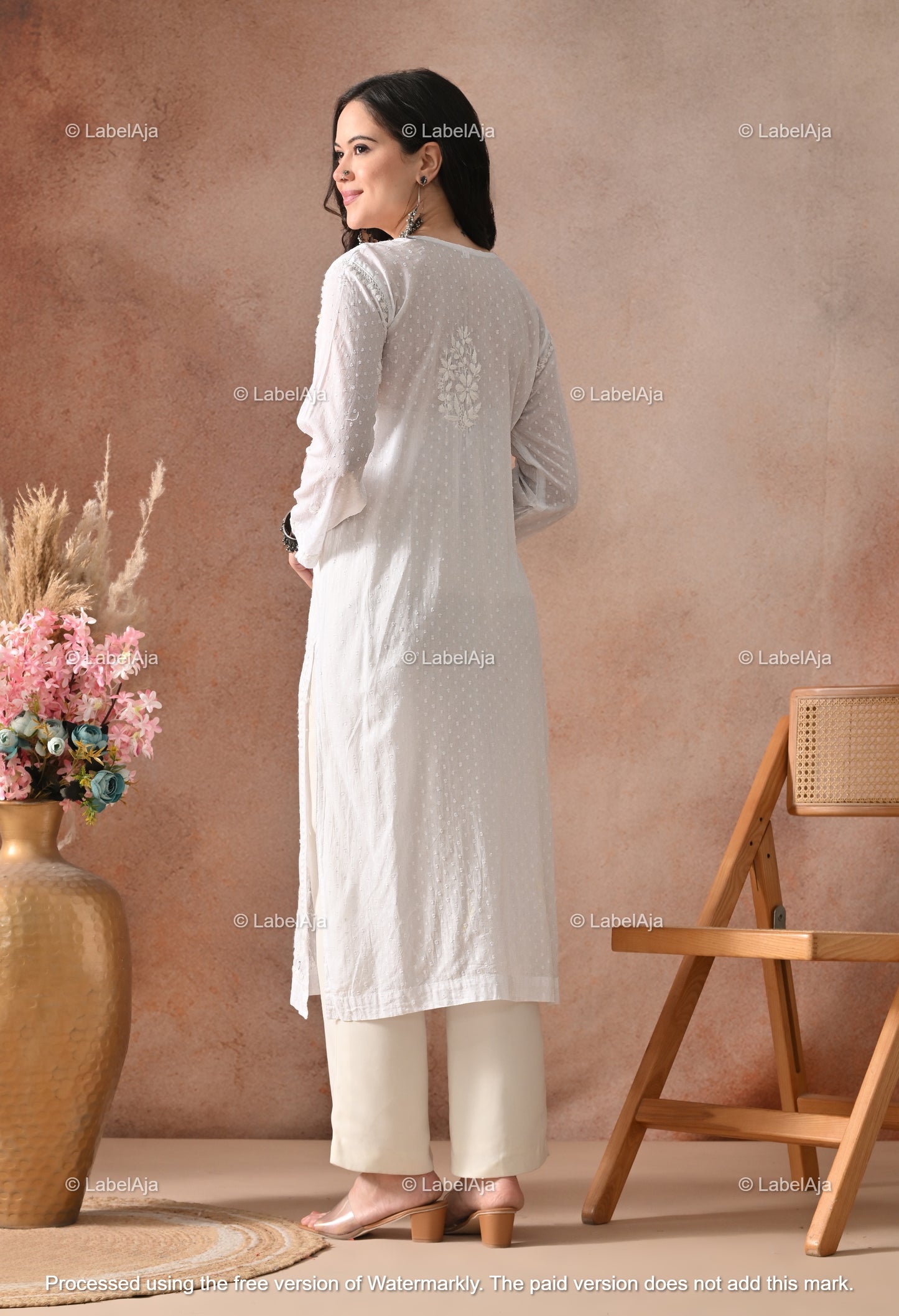 Avni White soft cotton long chikankari kurti