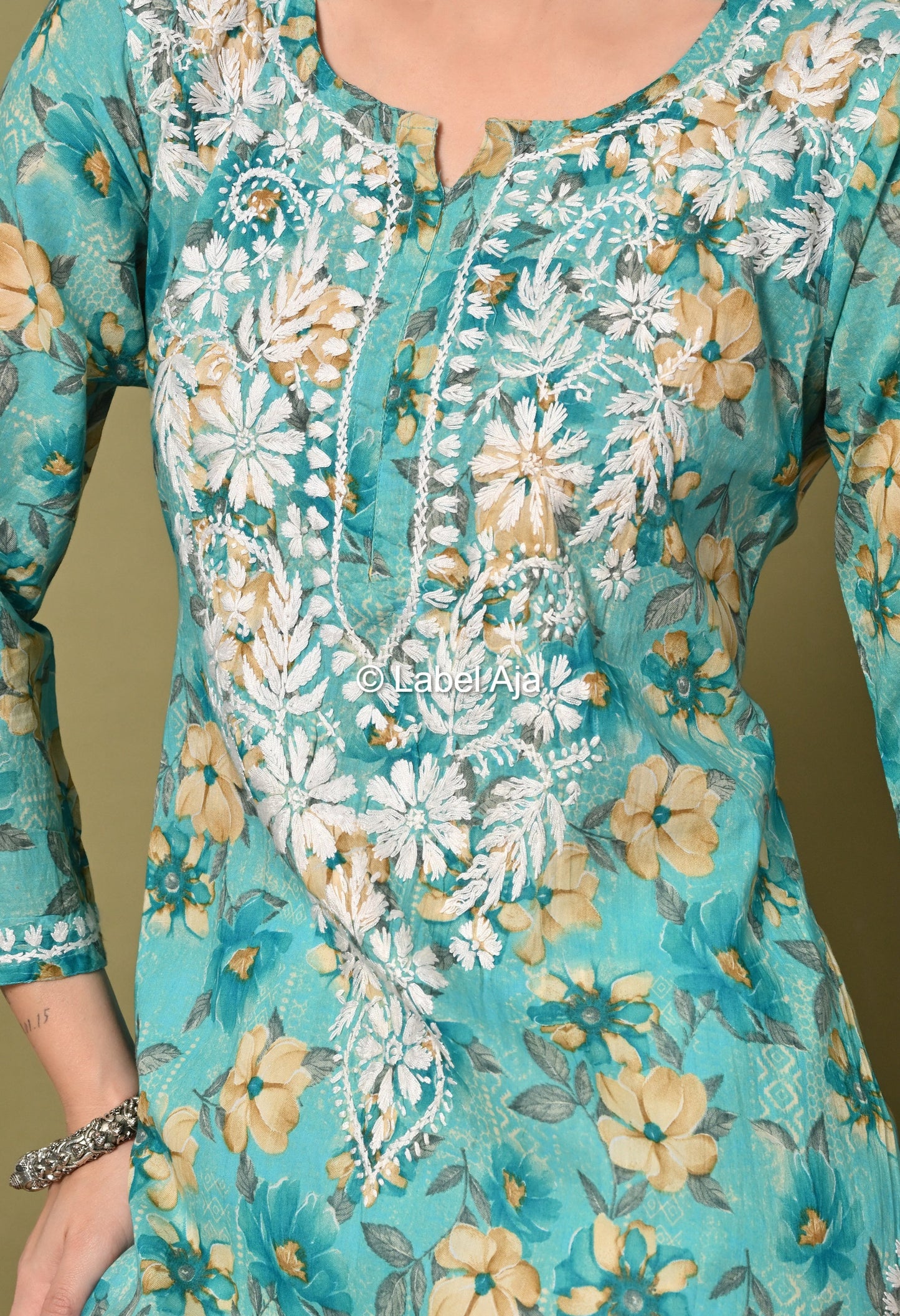Pankhuri mulmul long chikankari kurti