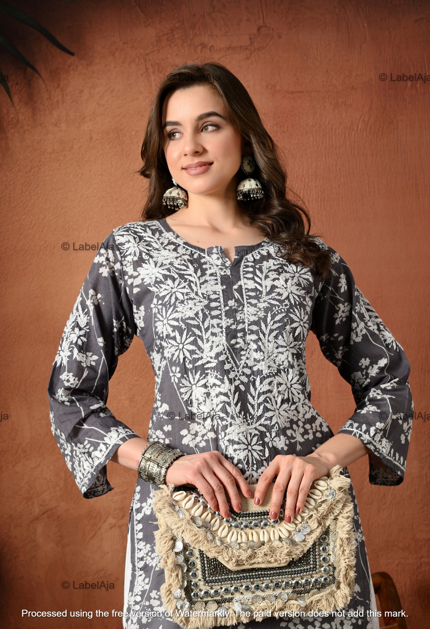 Pankhuri mulmul long chikankari kurti