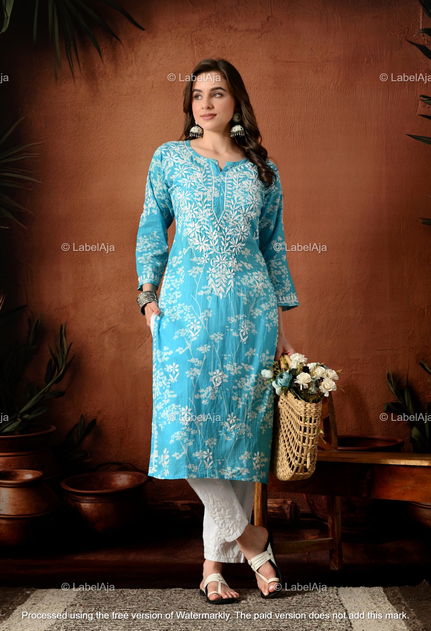 Pankhuri mulmul long chikankari kurti