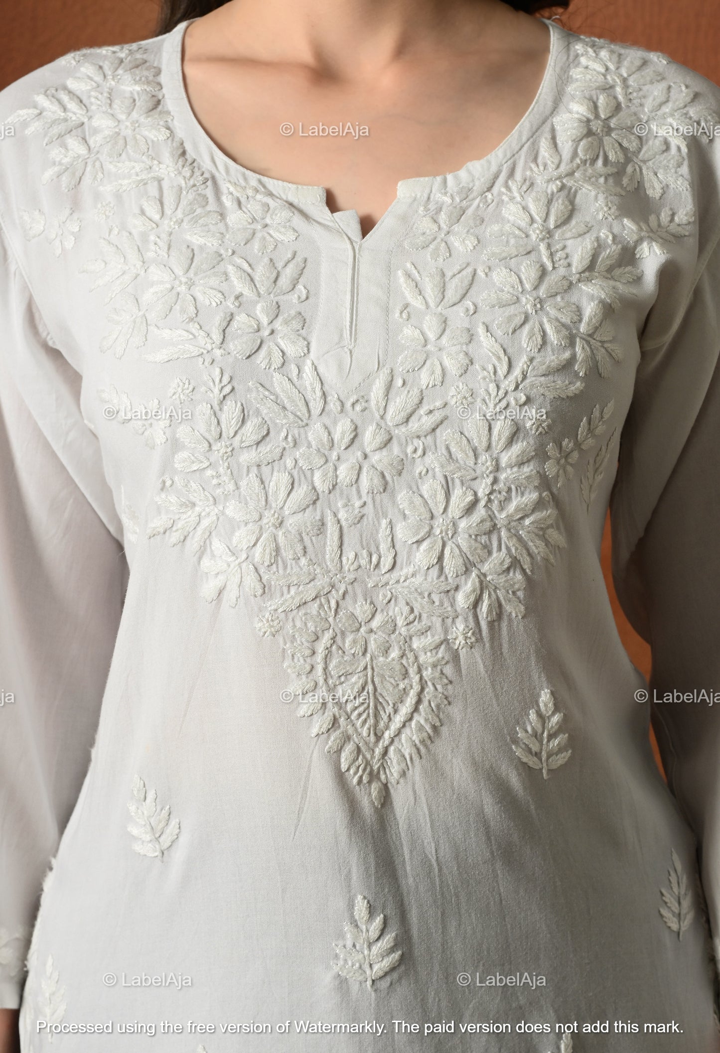 Mira white short rayon chikankari kurti