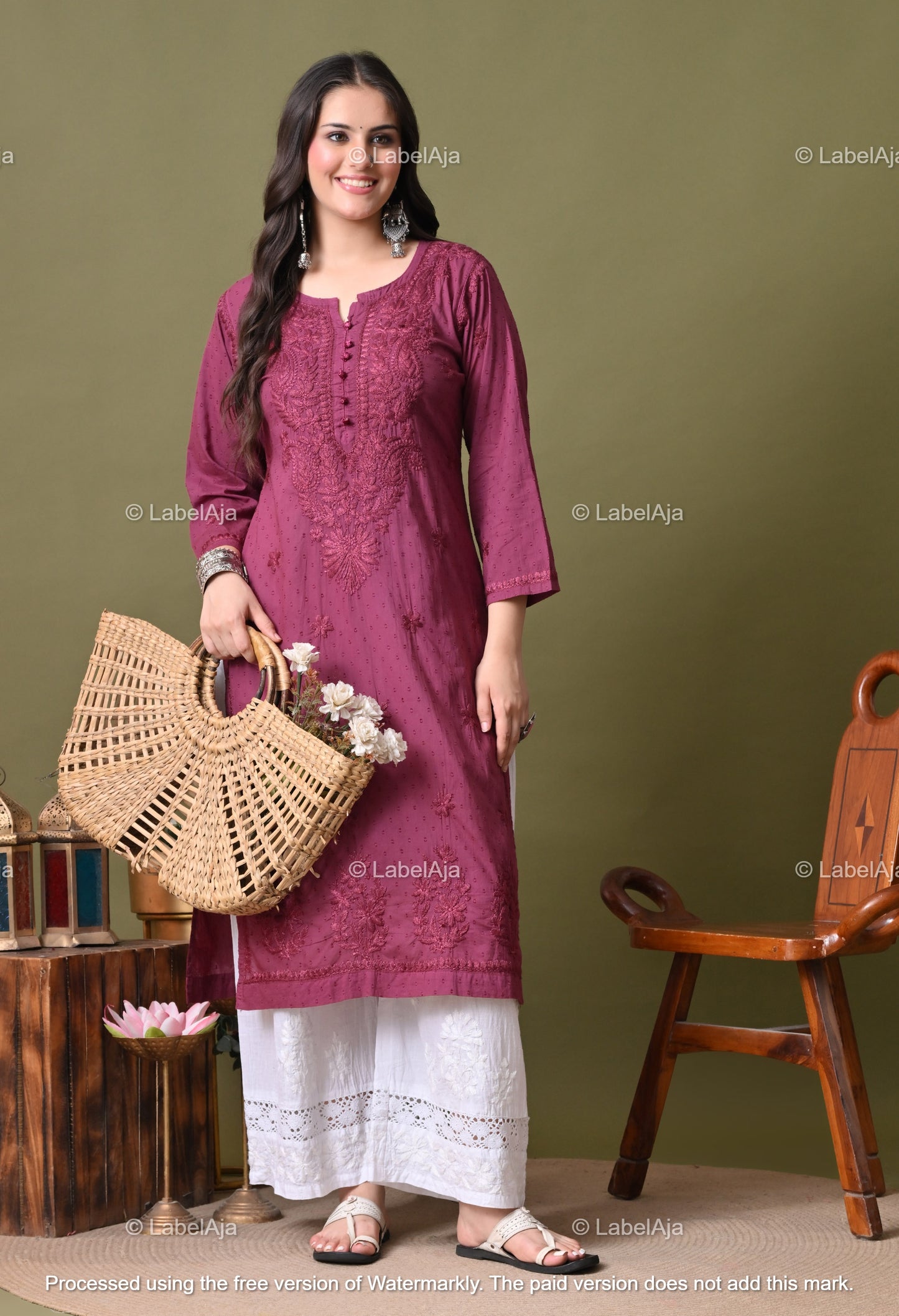 Avni White soft cotton long chikankari kurti