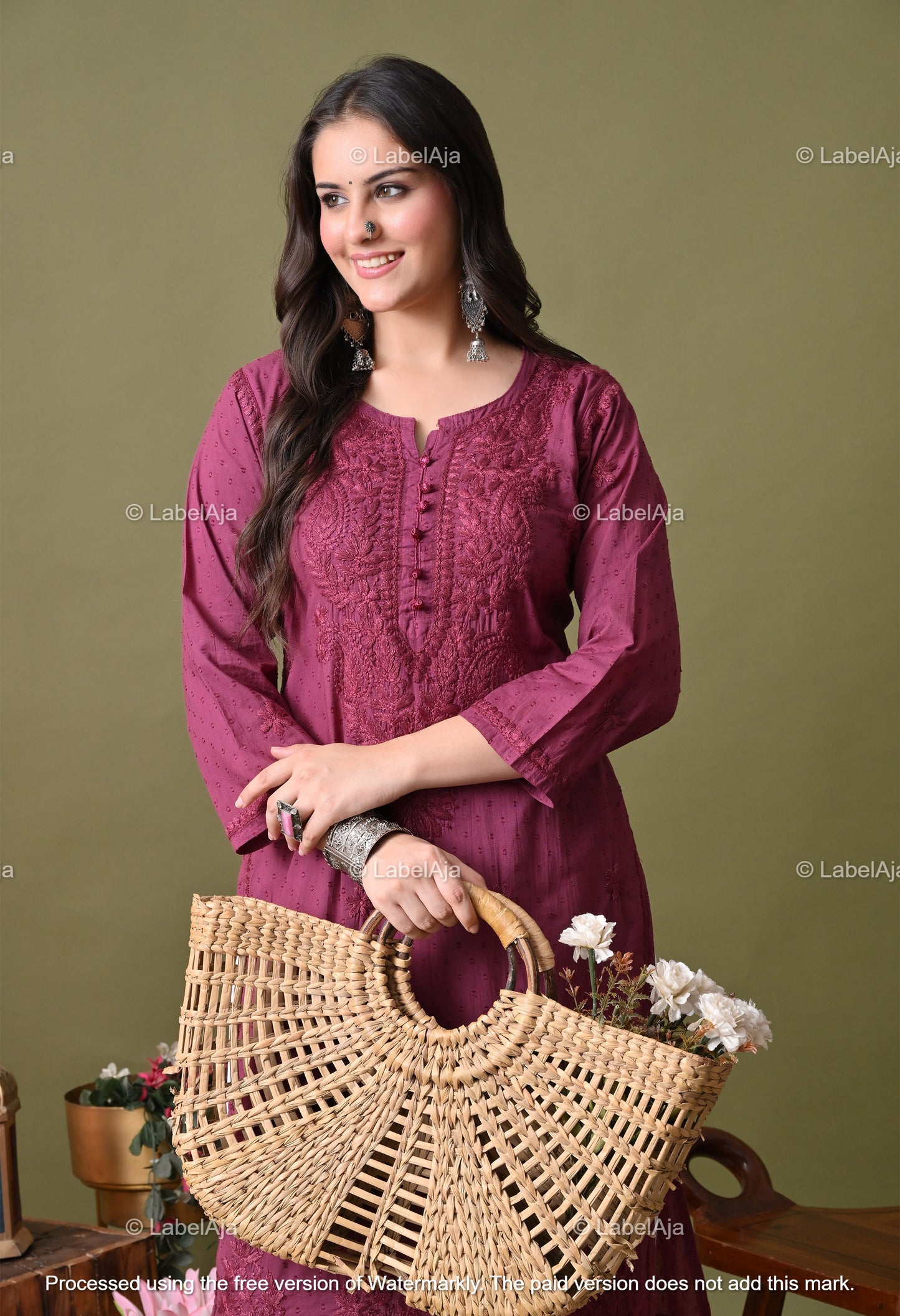 Avni White soft cotton long chikankari kurti