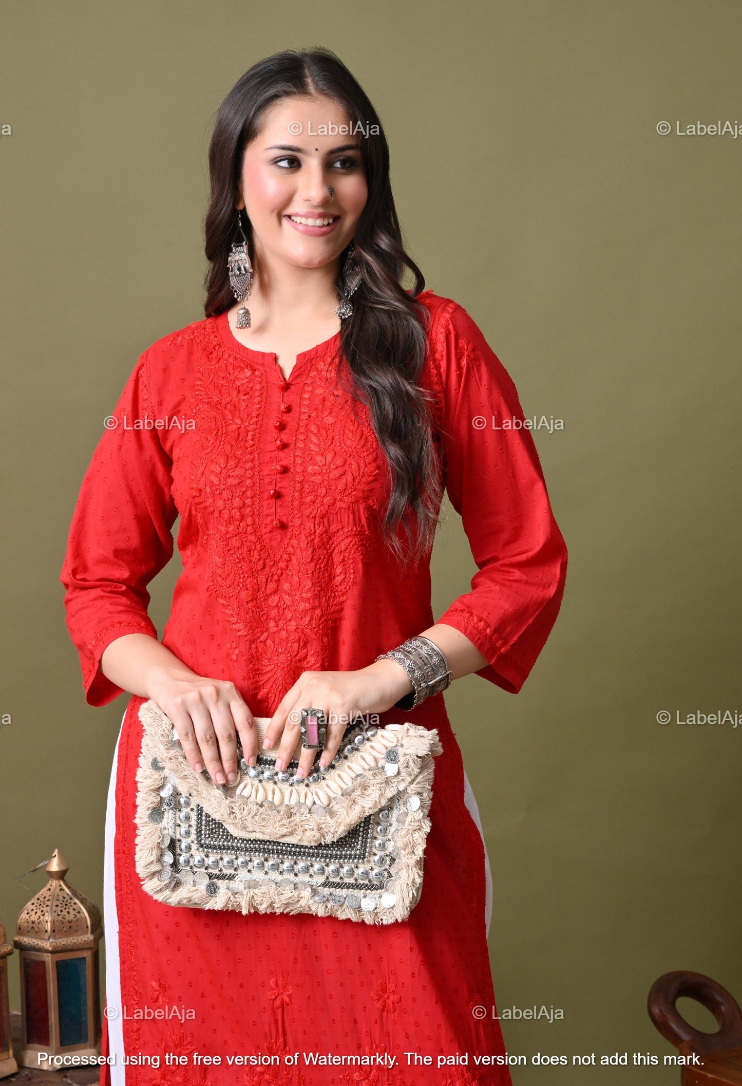 Avni White soft cotton long chikankari kurti