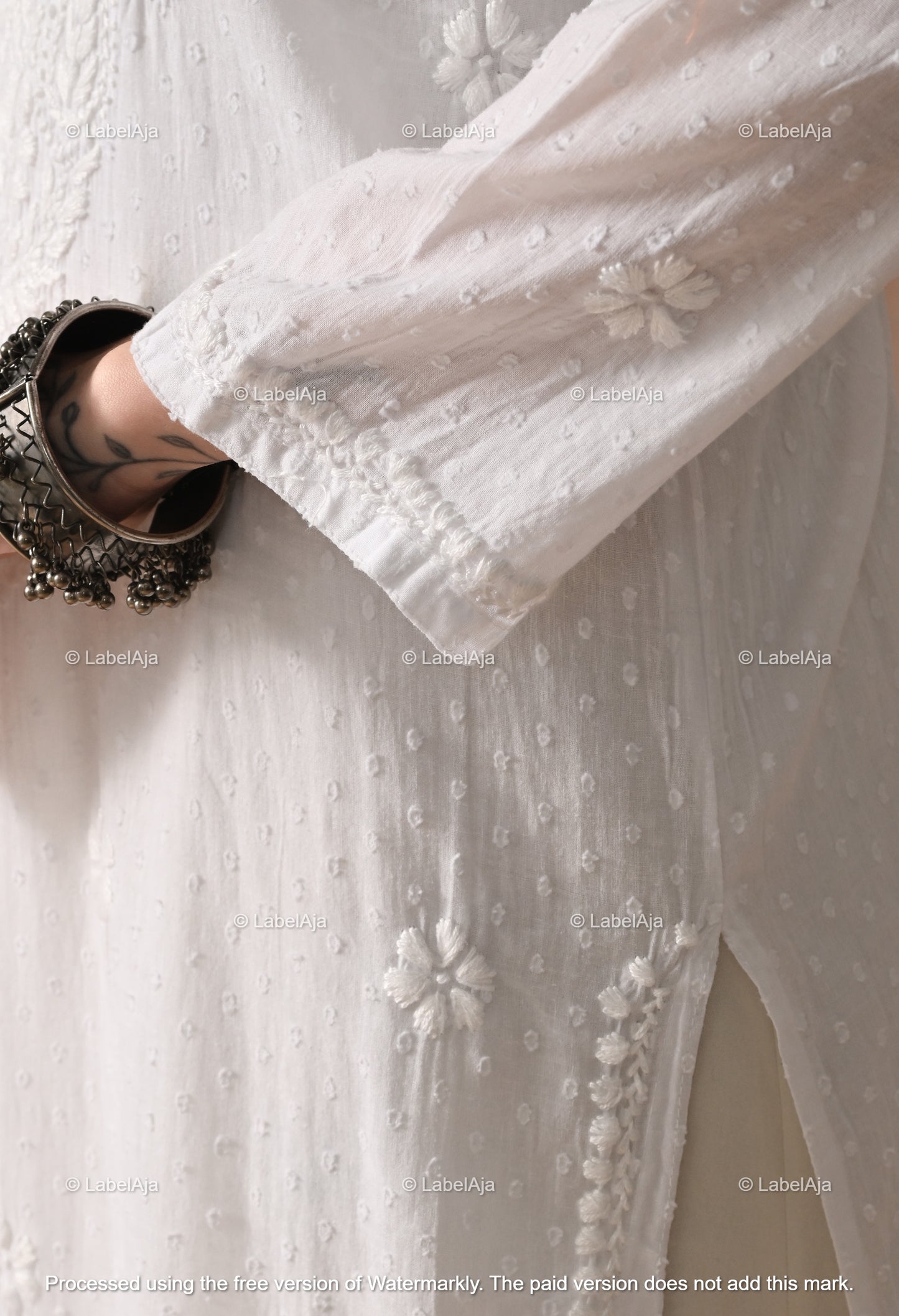 Avni White soft cotton long chikankari kurti