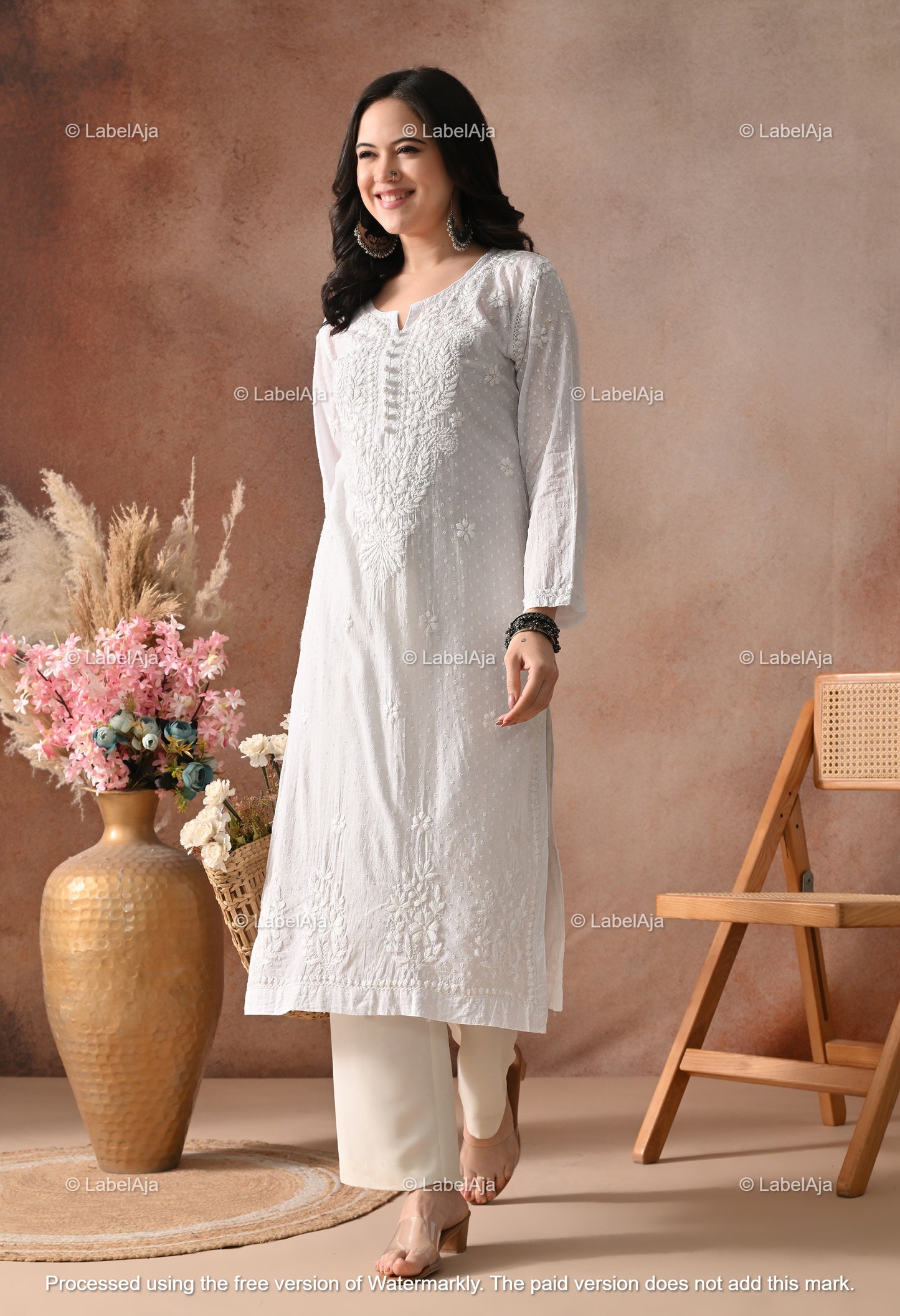 Avni White soft cotton long chikankari kurti