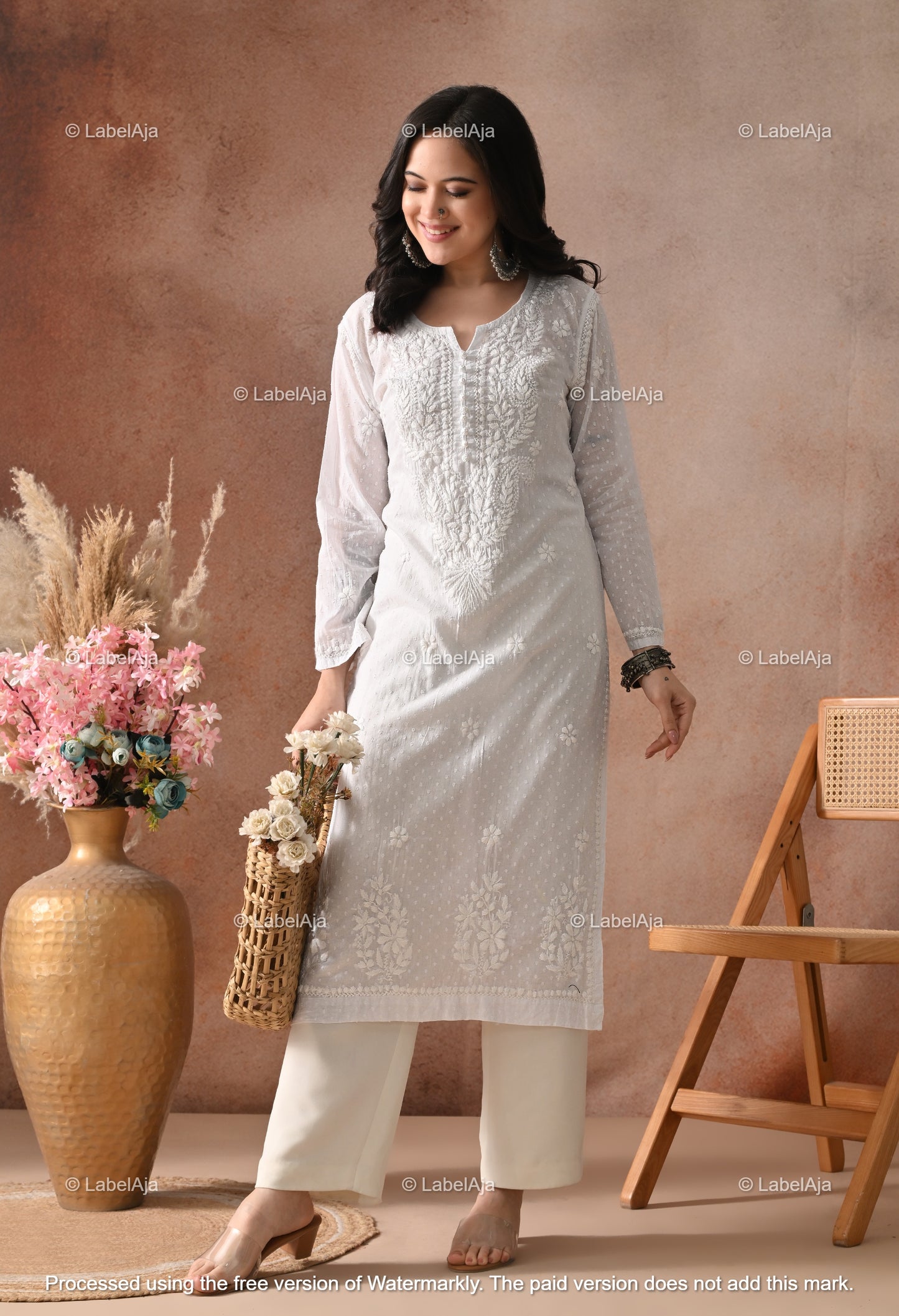 Avni White soft cotton long chikankari kurti